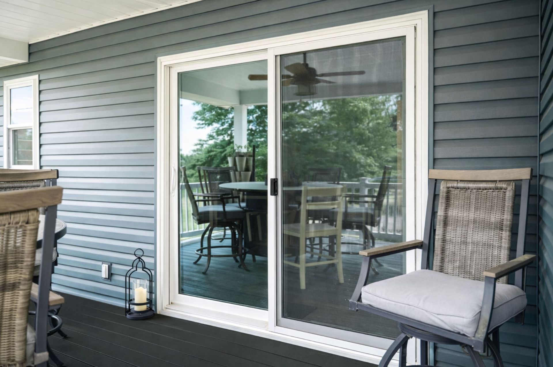 Sliding patio door repair in a Boise, ID home opening to a covered outdoor patio