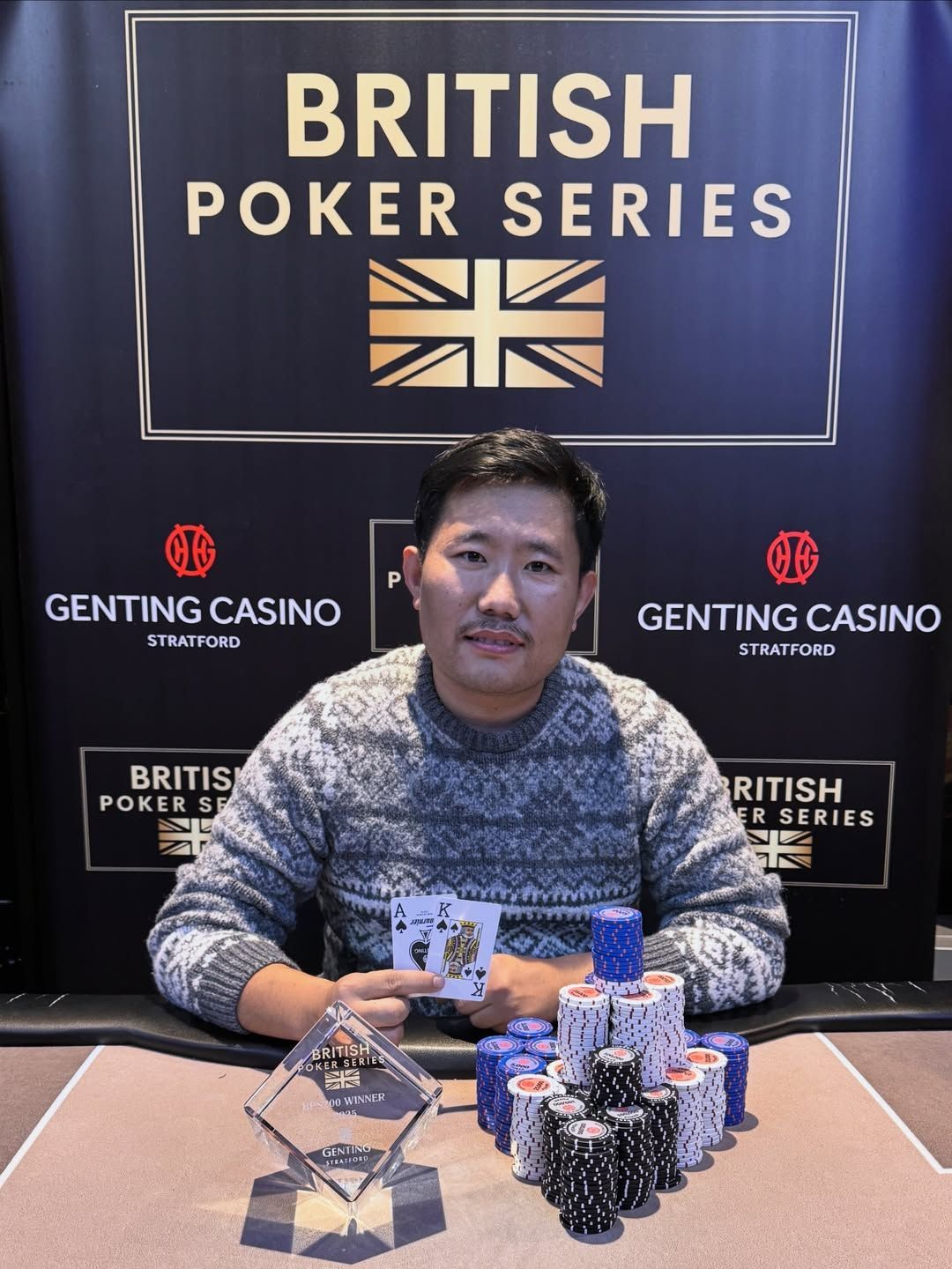 BPS Champion , trophy, and chips at a British Poker Series event.