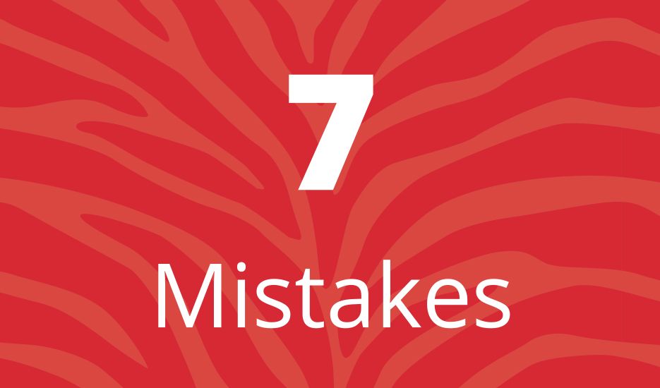 A red background with the number 7 and the word mistakes