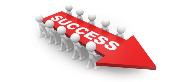 A group of people are holding a red arrow that says success.