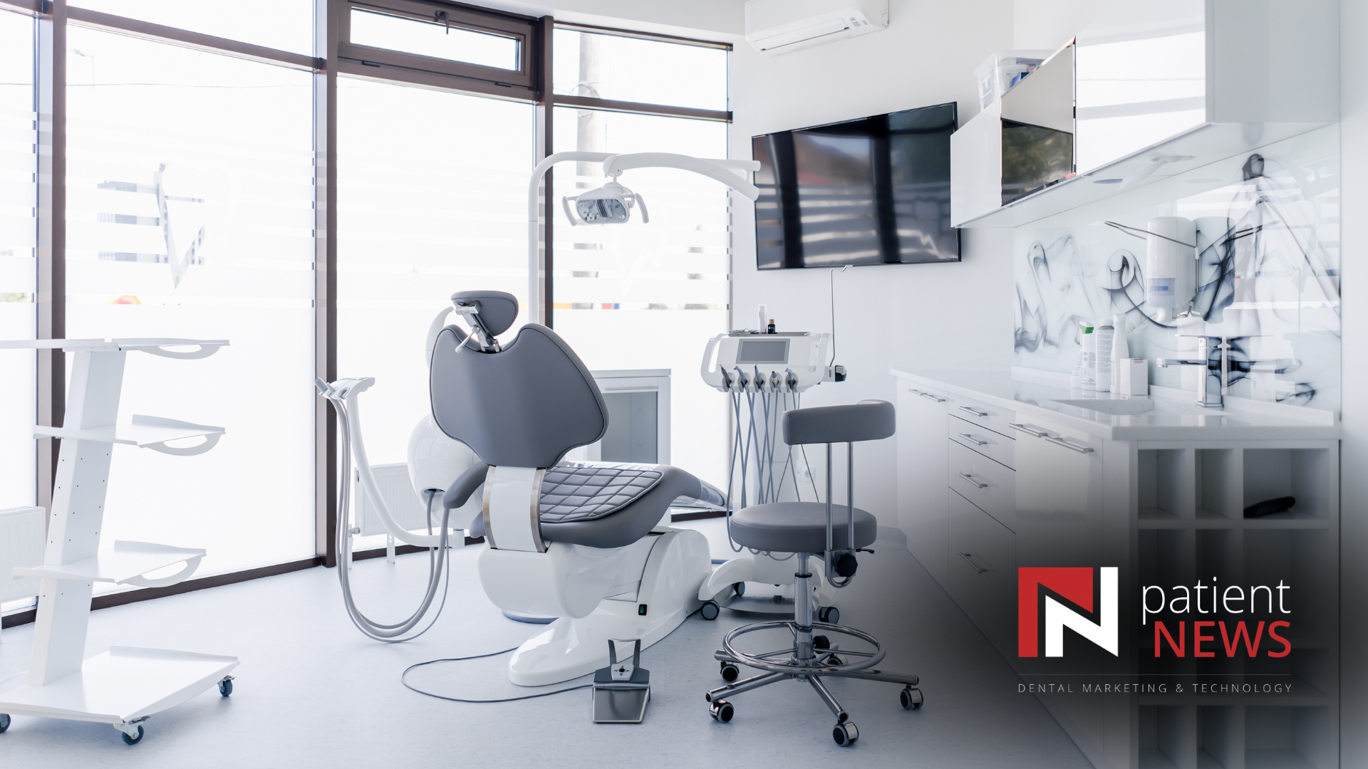 A dental office with a dental chair and a sink.