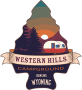 A logo for western hills campground with a red trailer