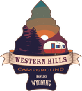 Logo for Western Hills Campground in Rawlins, Wyoming, featuring a sunset, pine trees, and a vintage camper in an arrowhead.