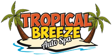 Tropical Breeze Auto Spa logo with palm trees and beach background.