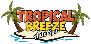 Tropical Breeze Auto Spa logo with palm trees and beach background.