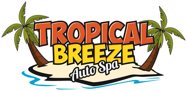 Tropical Breeze Auto Spa logo with palm trees and beach background.