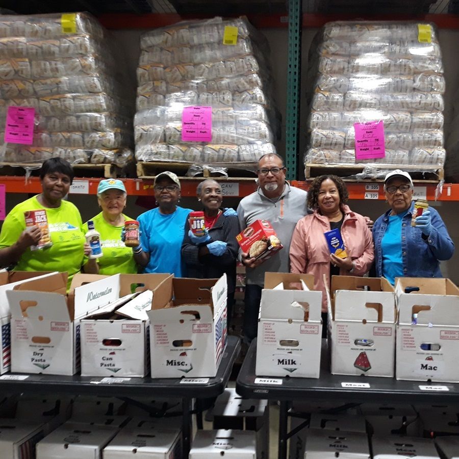 Picture of volunteers in our  warehouse