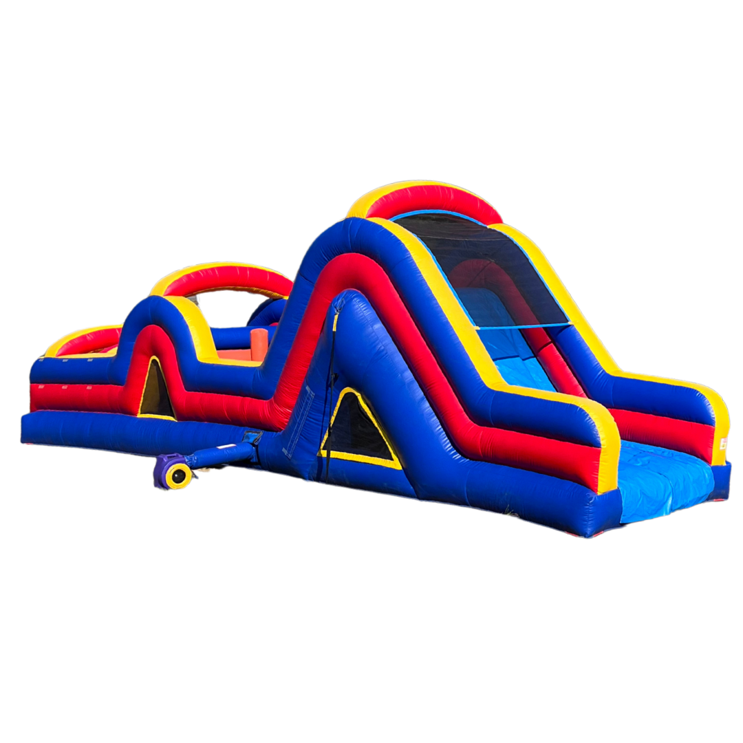 A blue , red , and yellow inflatable obstacle course with a slide.