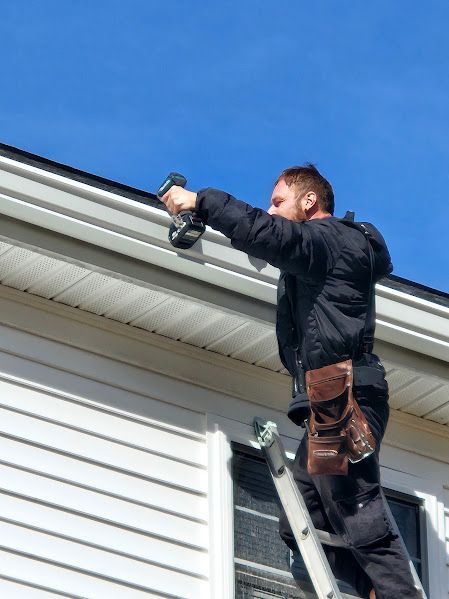 Andrew Williamson co owner installing 6