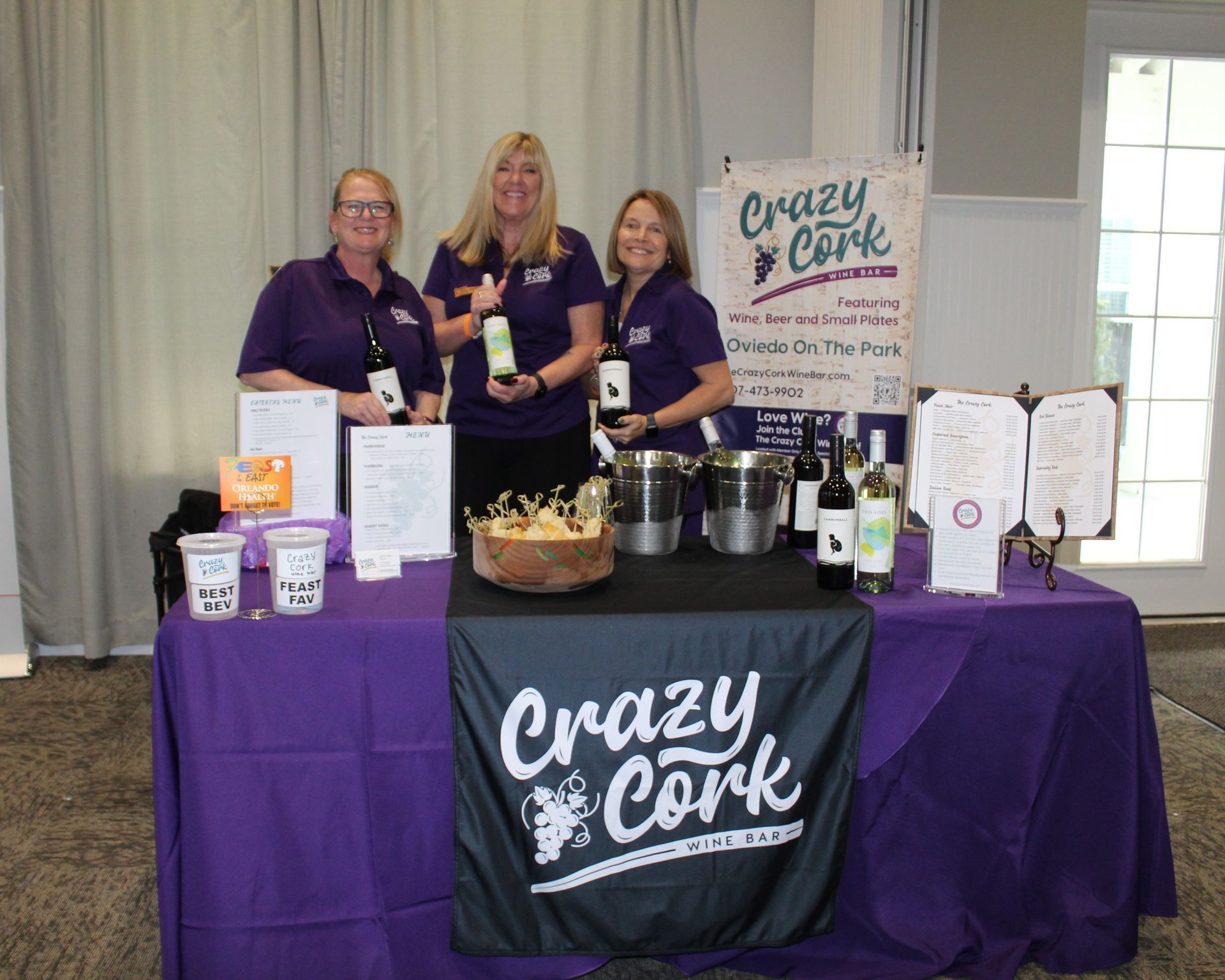 Three women at a table with 