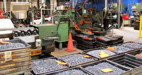 A warehouse filled with lots of containers of nuts and bolts