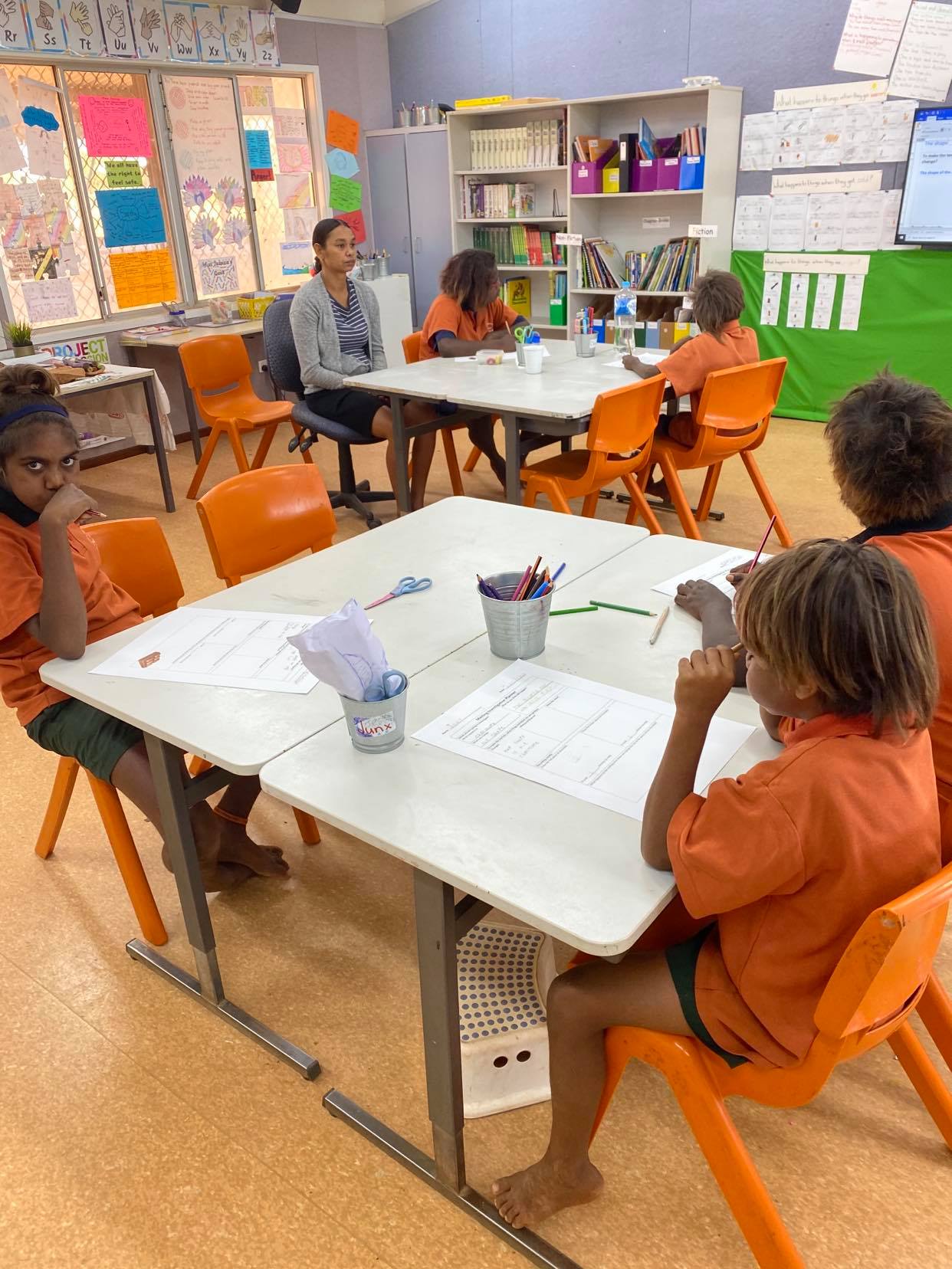 JPP Mulan students sitting at desks working in classroom
