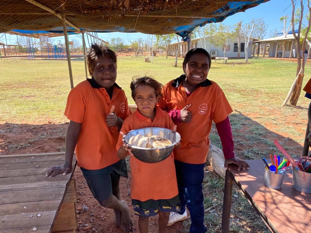 Senior Students outside standing in front of damper