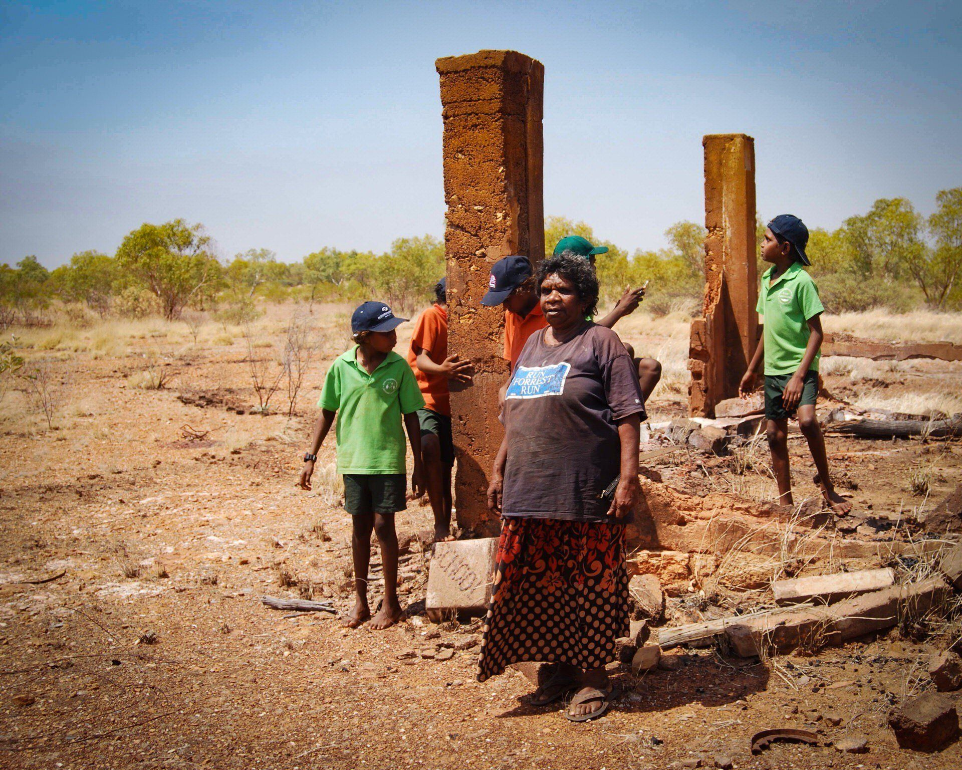 A female elder from Mulan WA with JPP School students