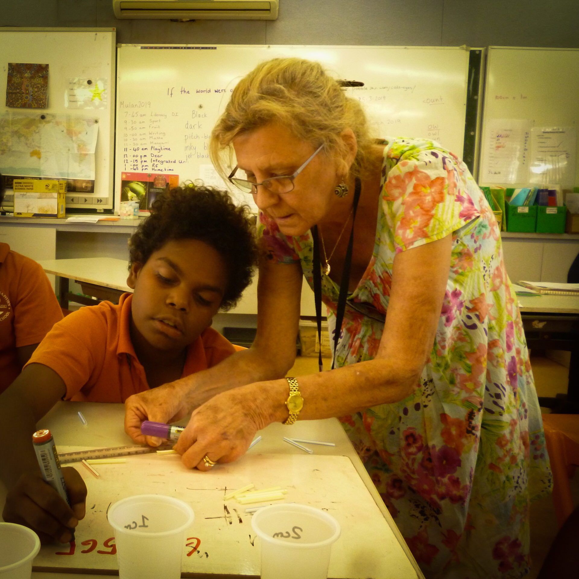 JPP School student being instructed by a teacher