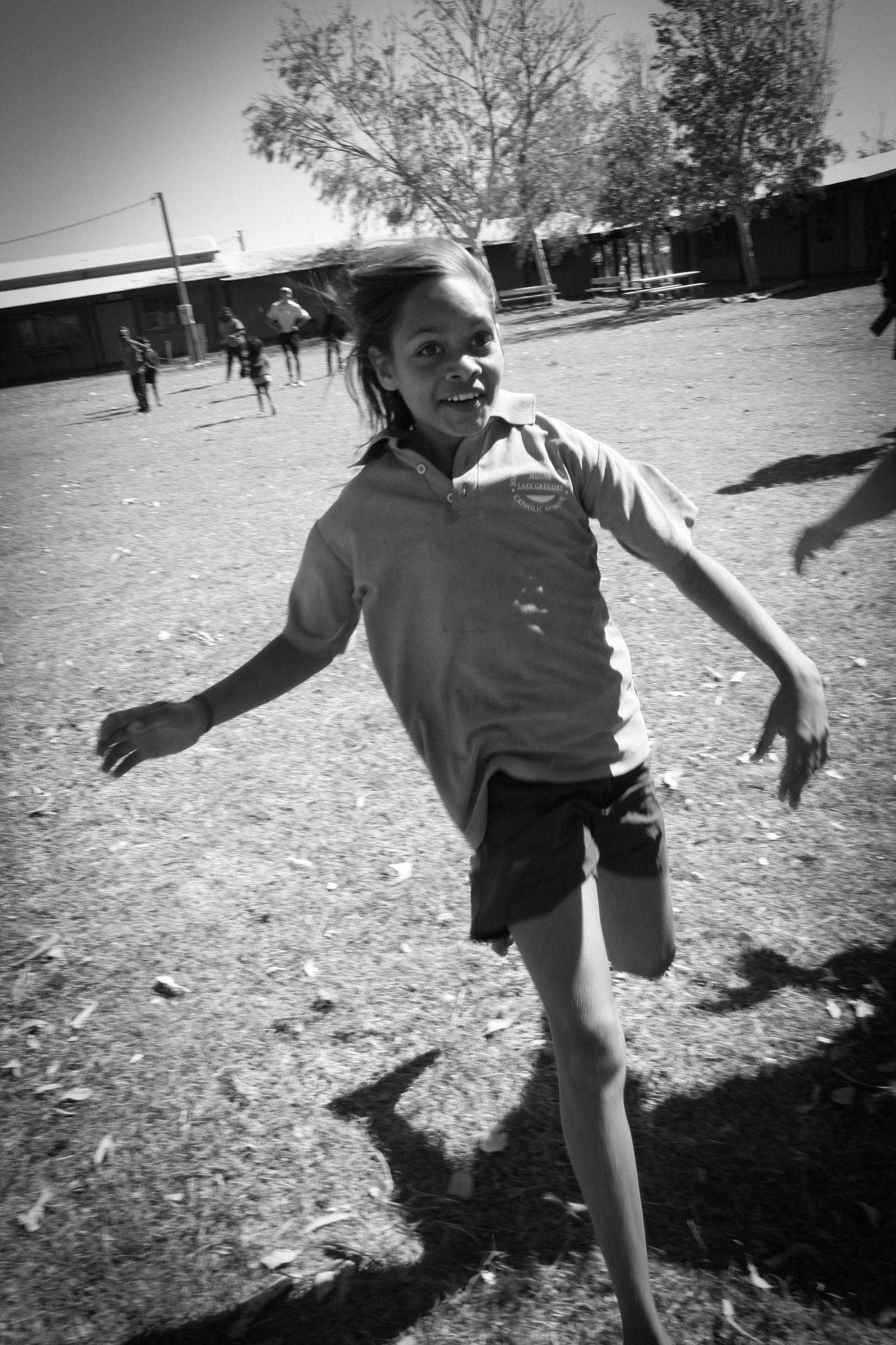 JPP School student sprinting outside