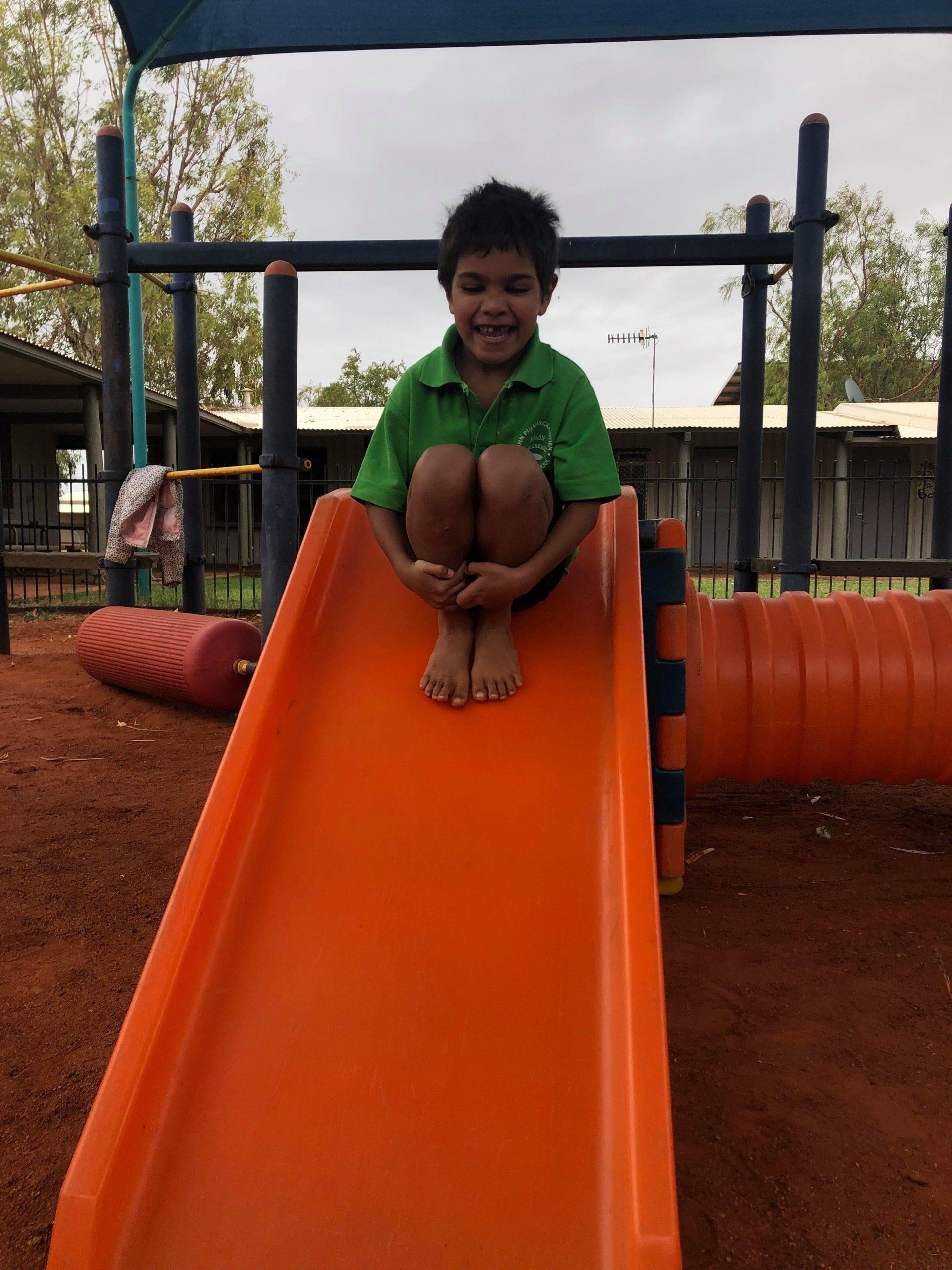 JPP Mulan student on a slide