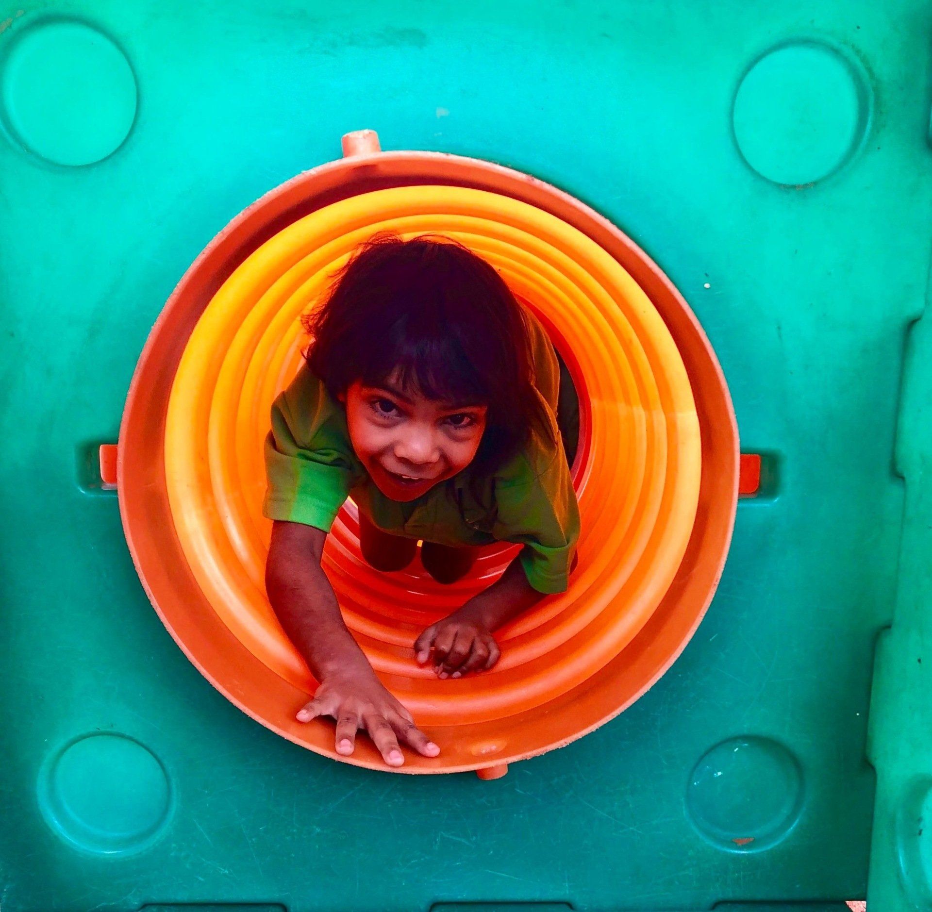 JPP student crawling through tunnel