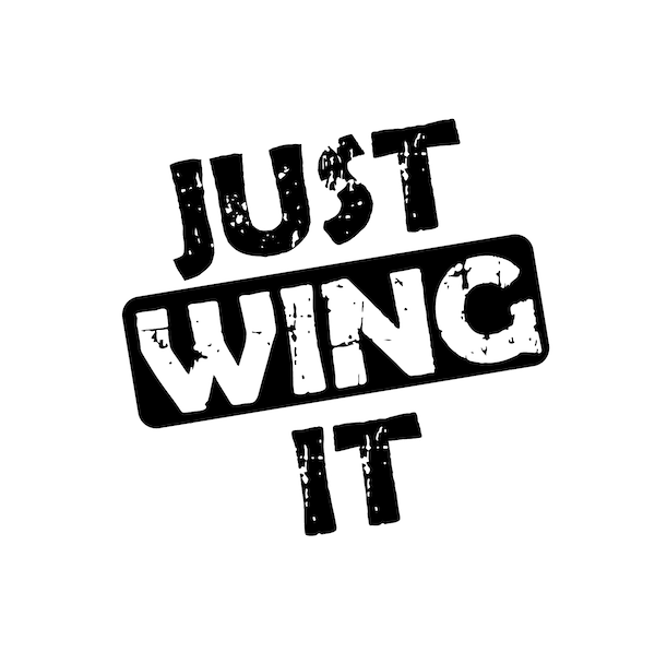 White Badge with the words Just Wing It