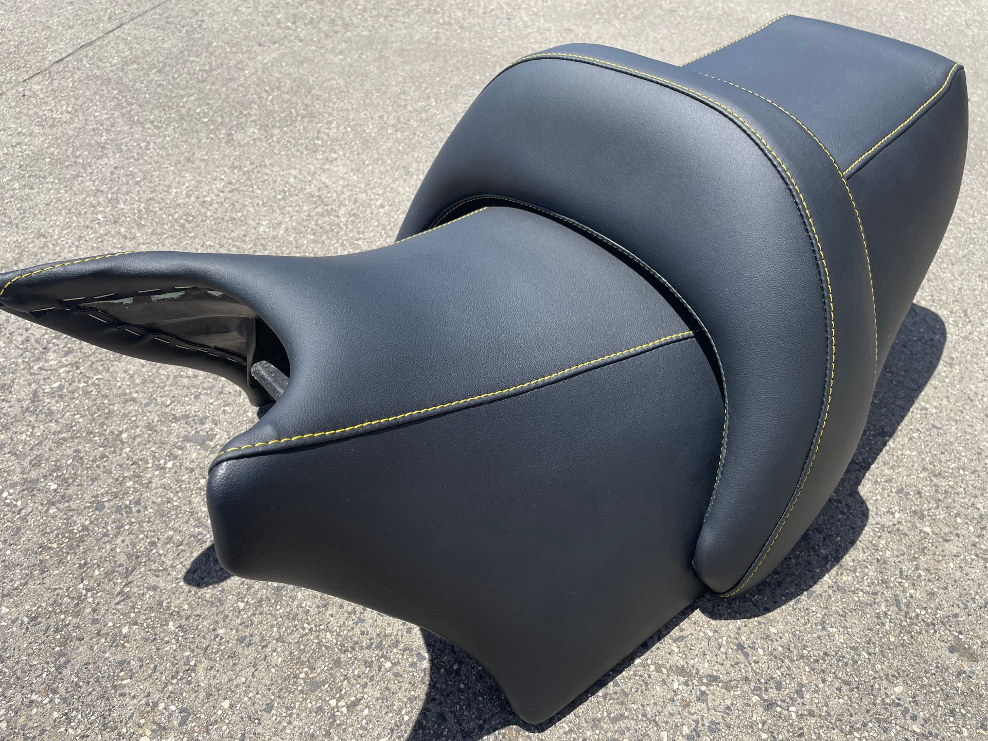 Yamaha V-Max motorbike seat in black vinyl with yellow stitching