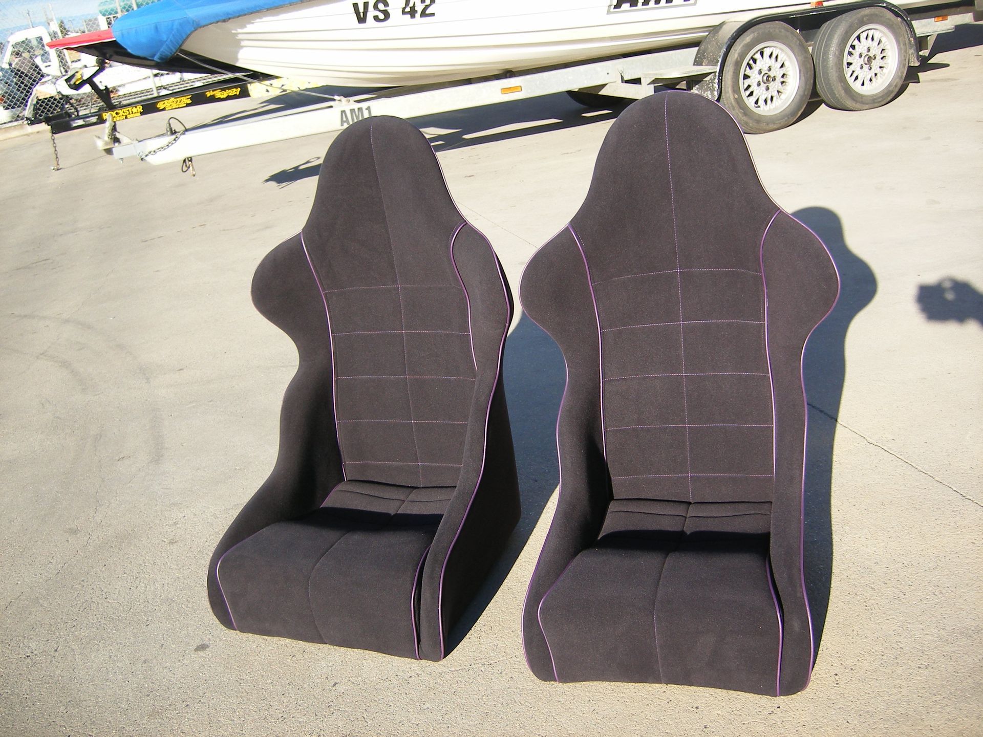 Black fibreglass racing seats