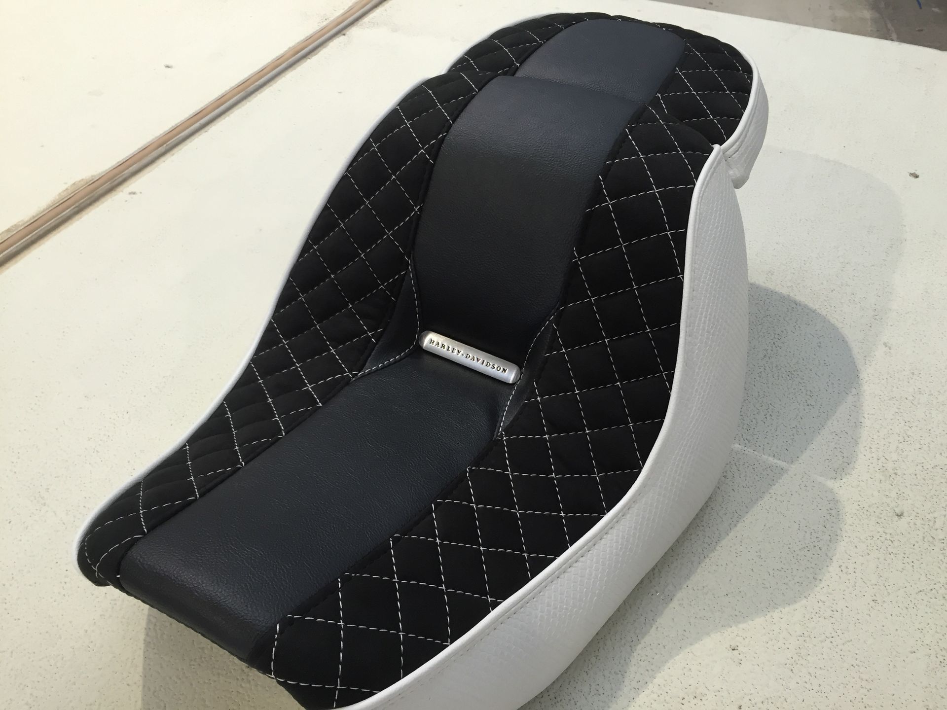 Black and white suede diamond stitched two piece Harley seat
