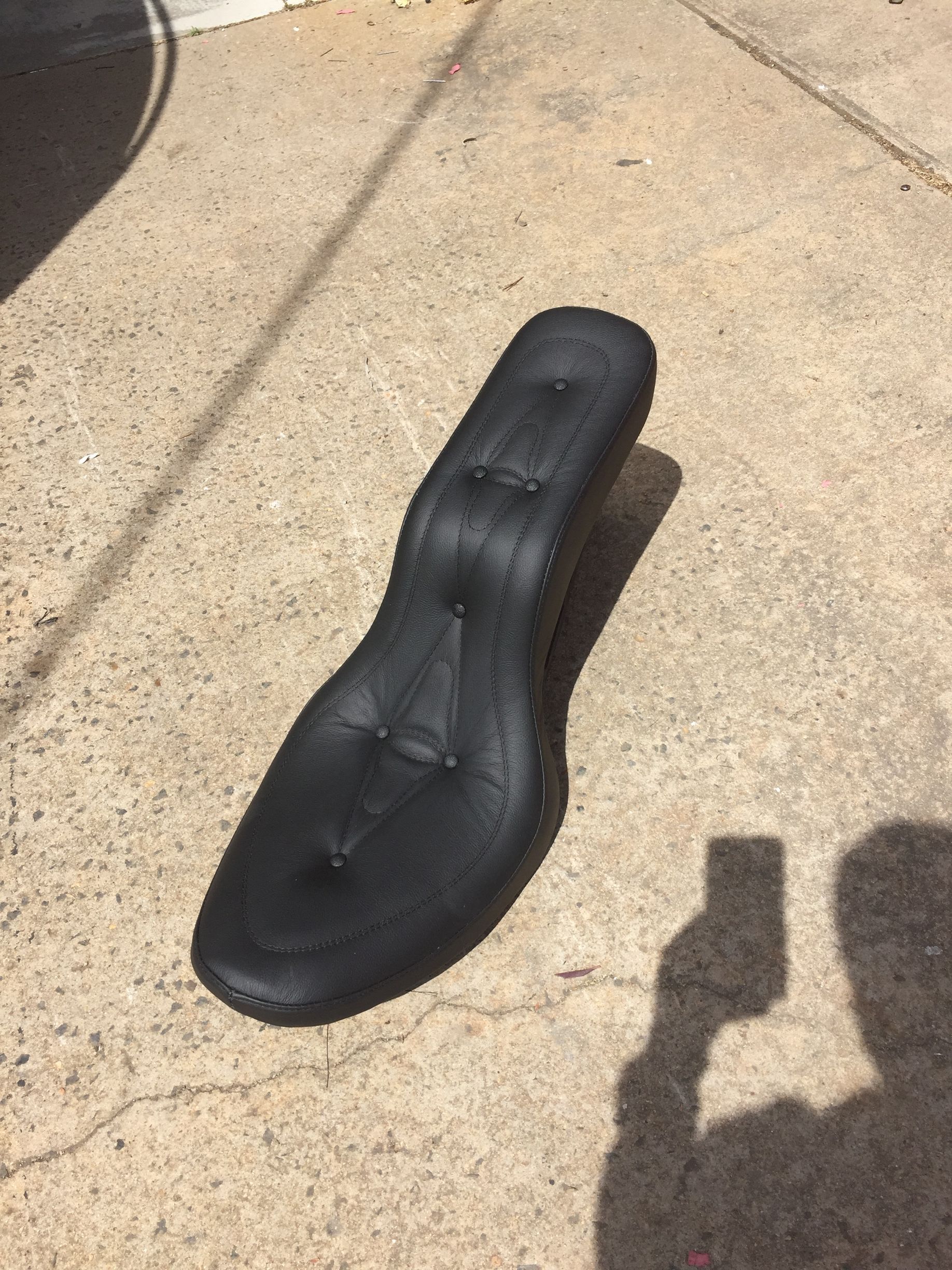 Black leather buttoned custom motorbike seat