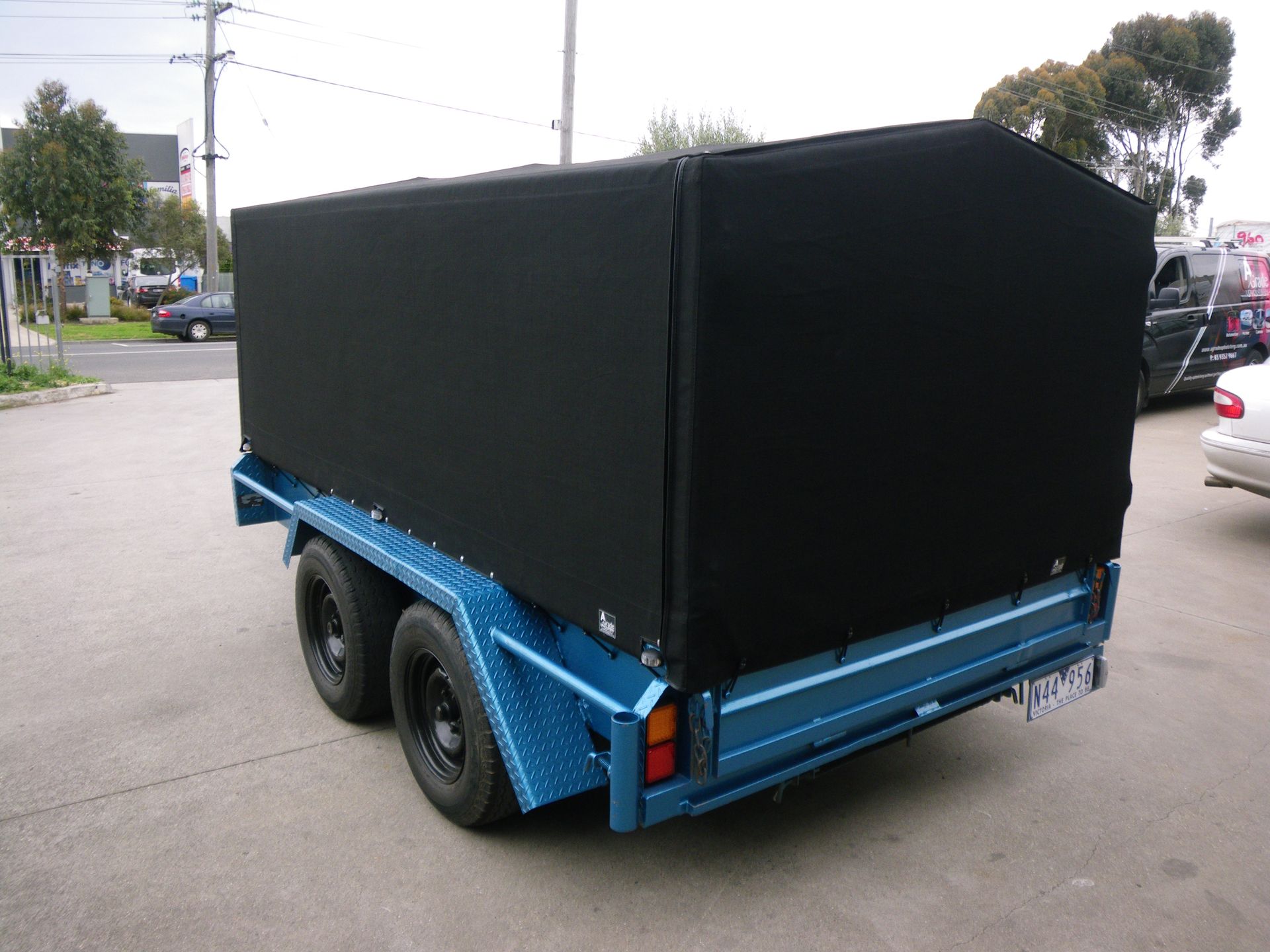 Canvas canopy for trailer with removeable back flap