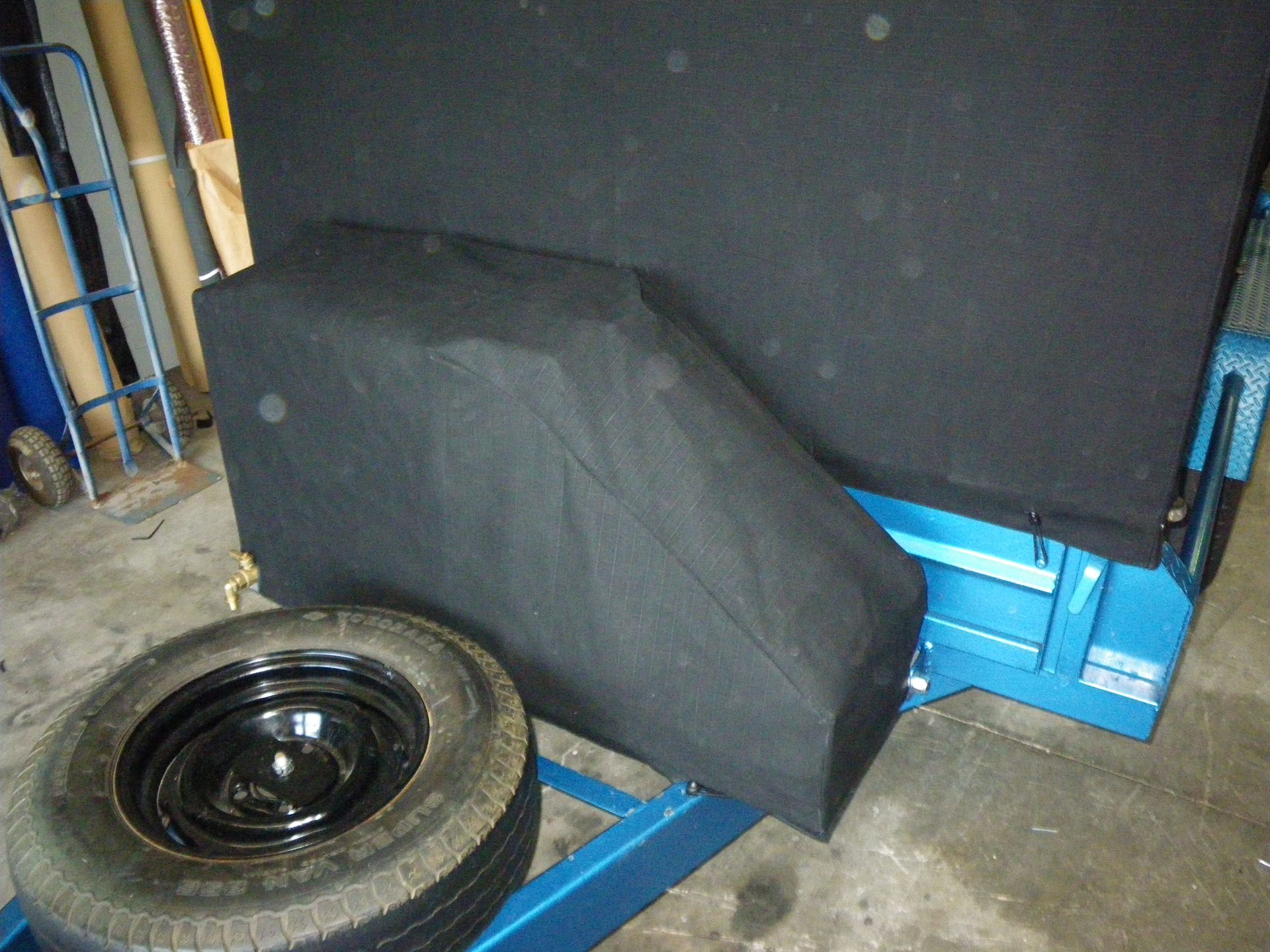 Canvas cover over tank and pump