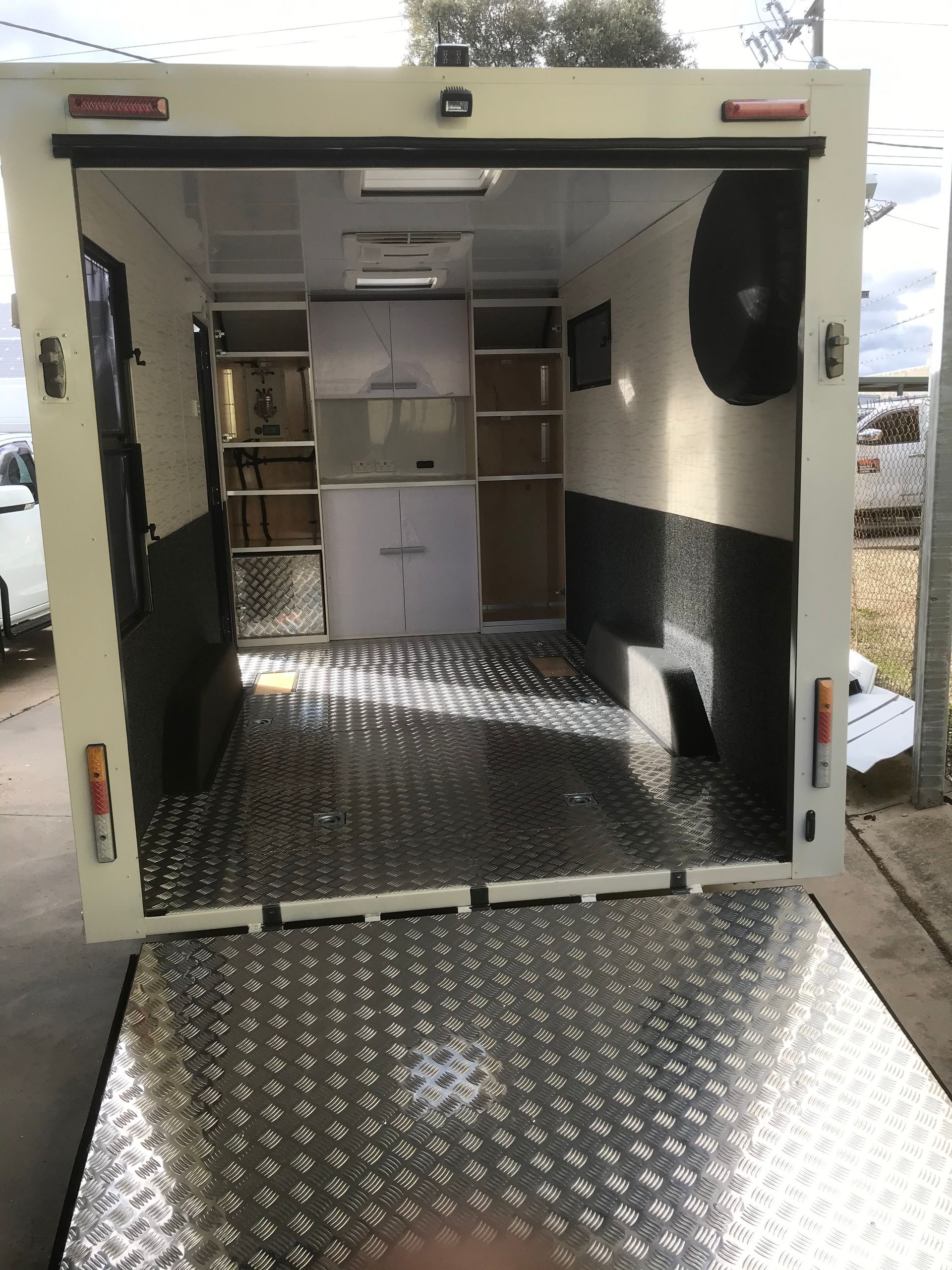 Charcoal carpet on walls and wheel arches