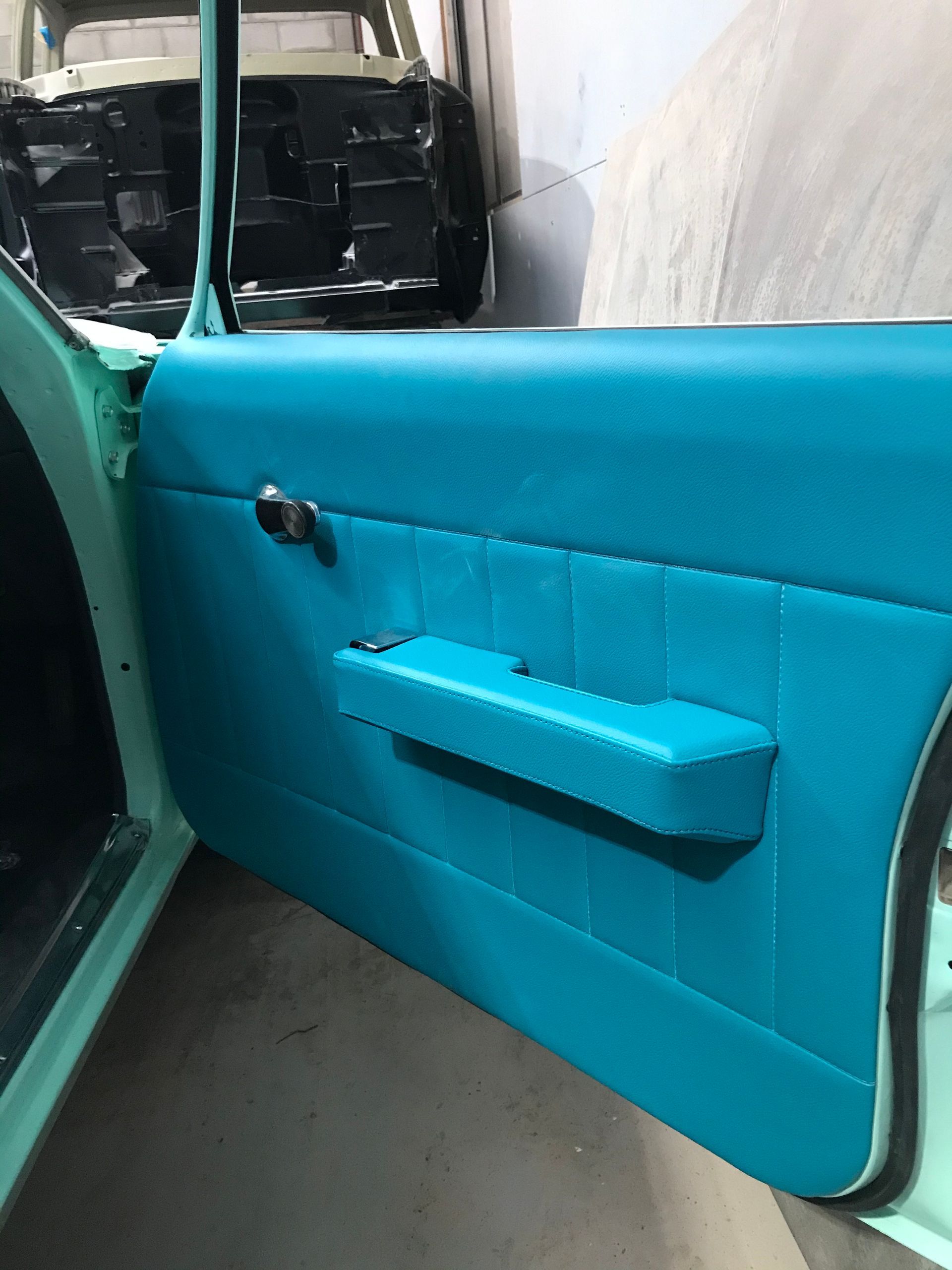 Custom wrapped Kingswood door trim and arm rest