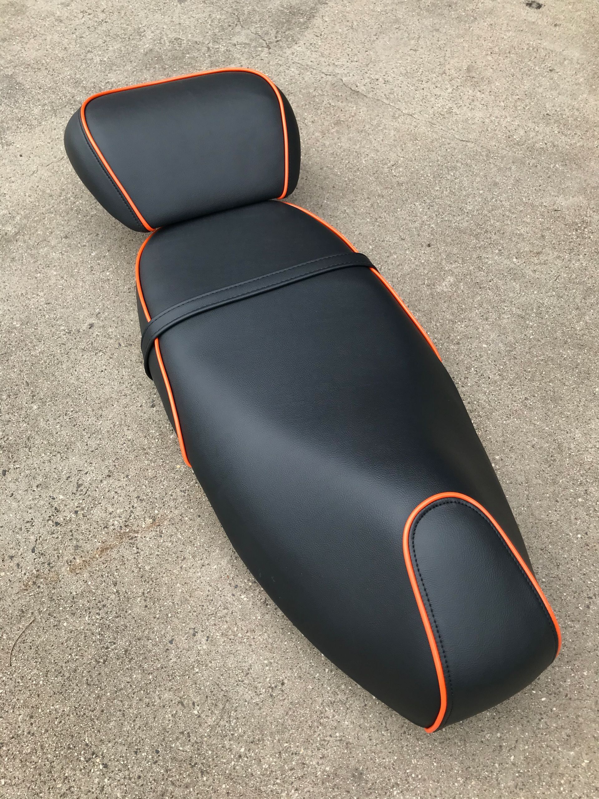 Custom black and orange Moped seat