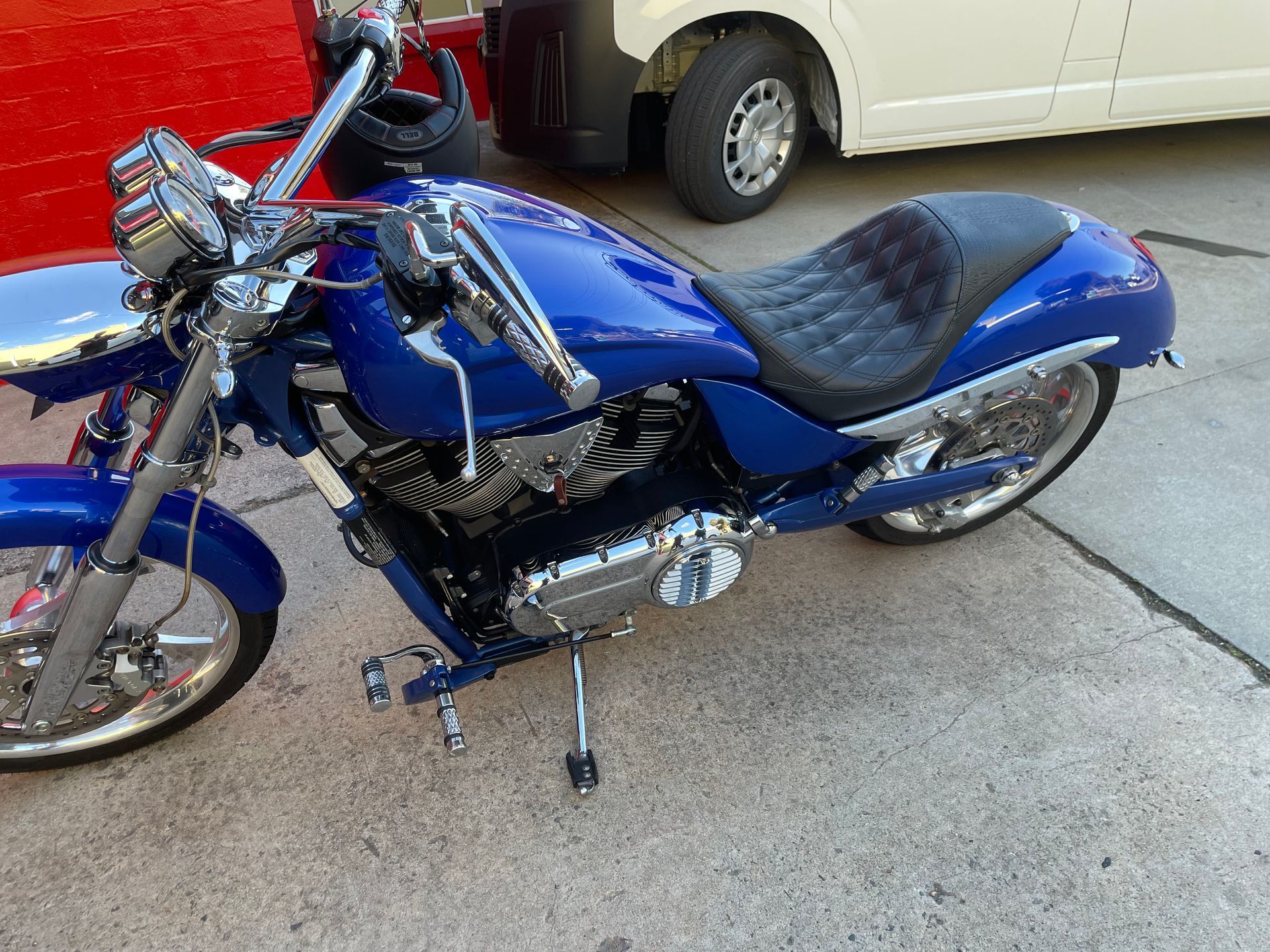 Custom cross stitch motorbike seat with croc skin