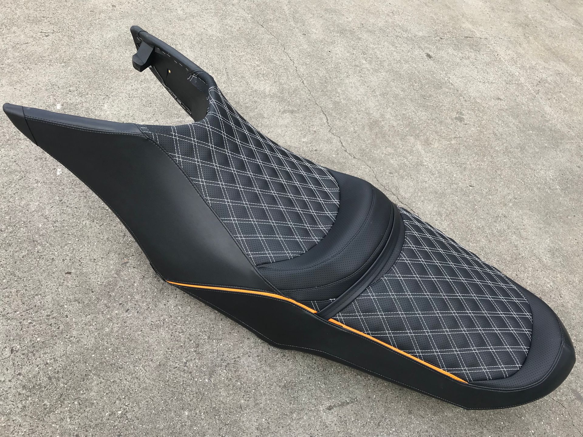 Customised jetski seat with white twin needle cross stitch