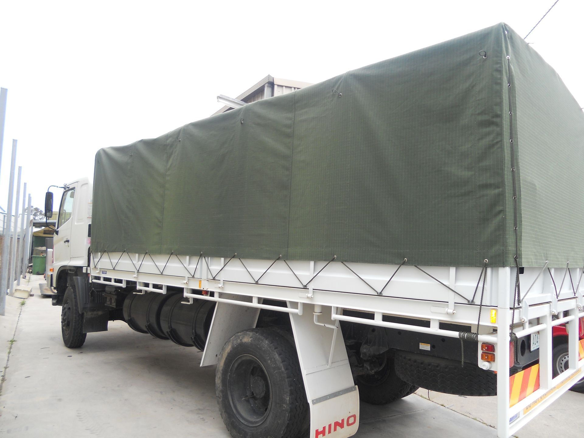 Green canvas truck canopy