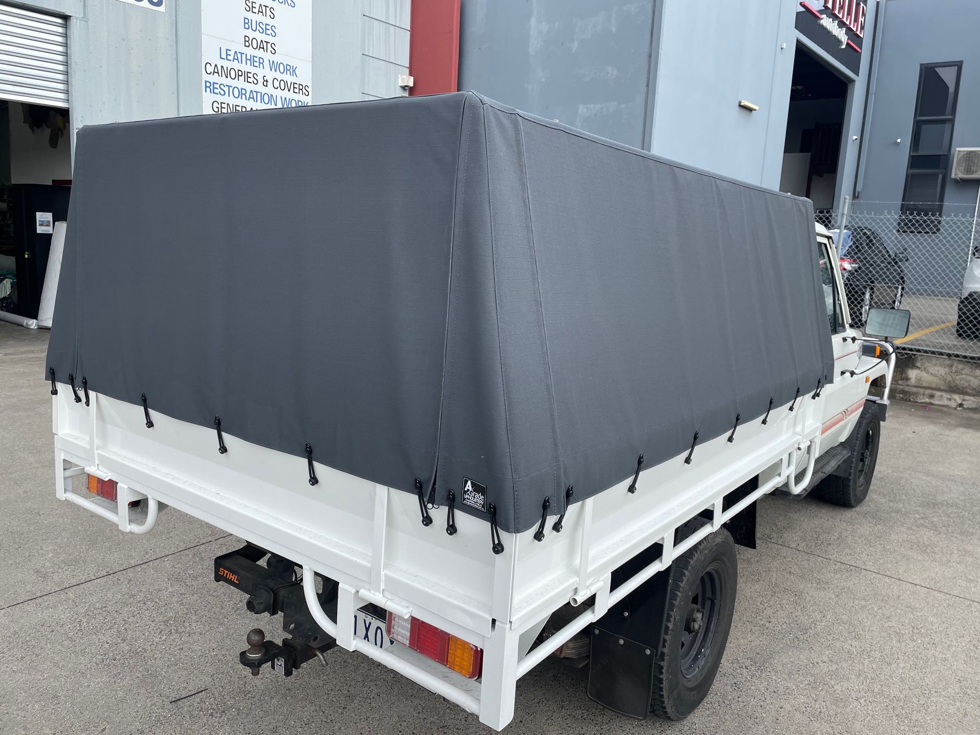 Grey canvas canopy on steel tray