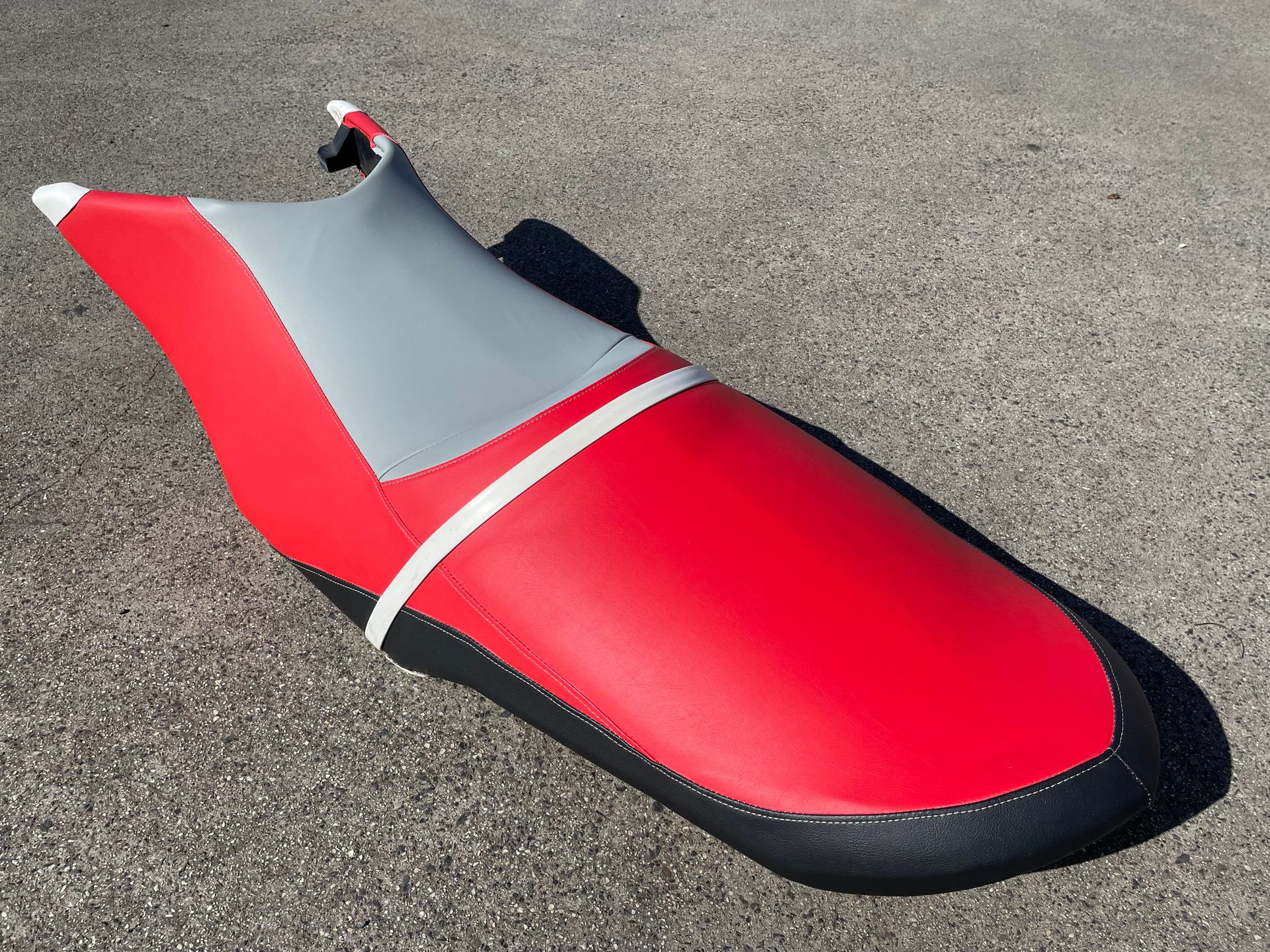 Jetski seat refurb in red, black and grey marine vinyl