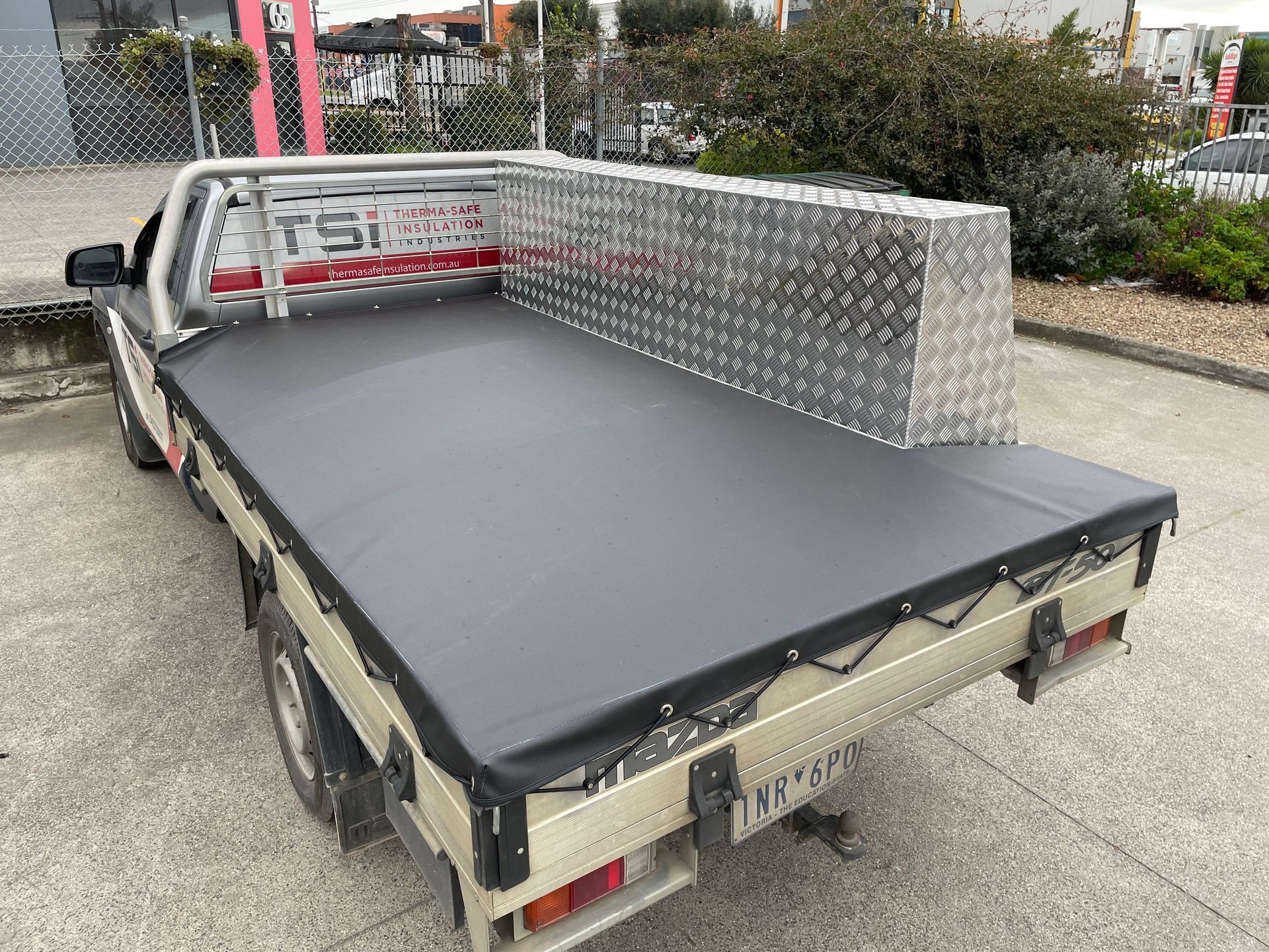 Mazda BT-50 tonneau attached to side toolbox