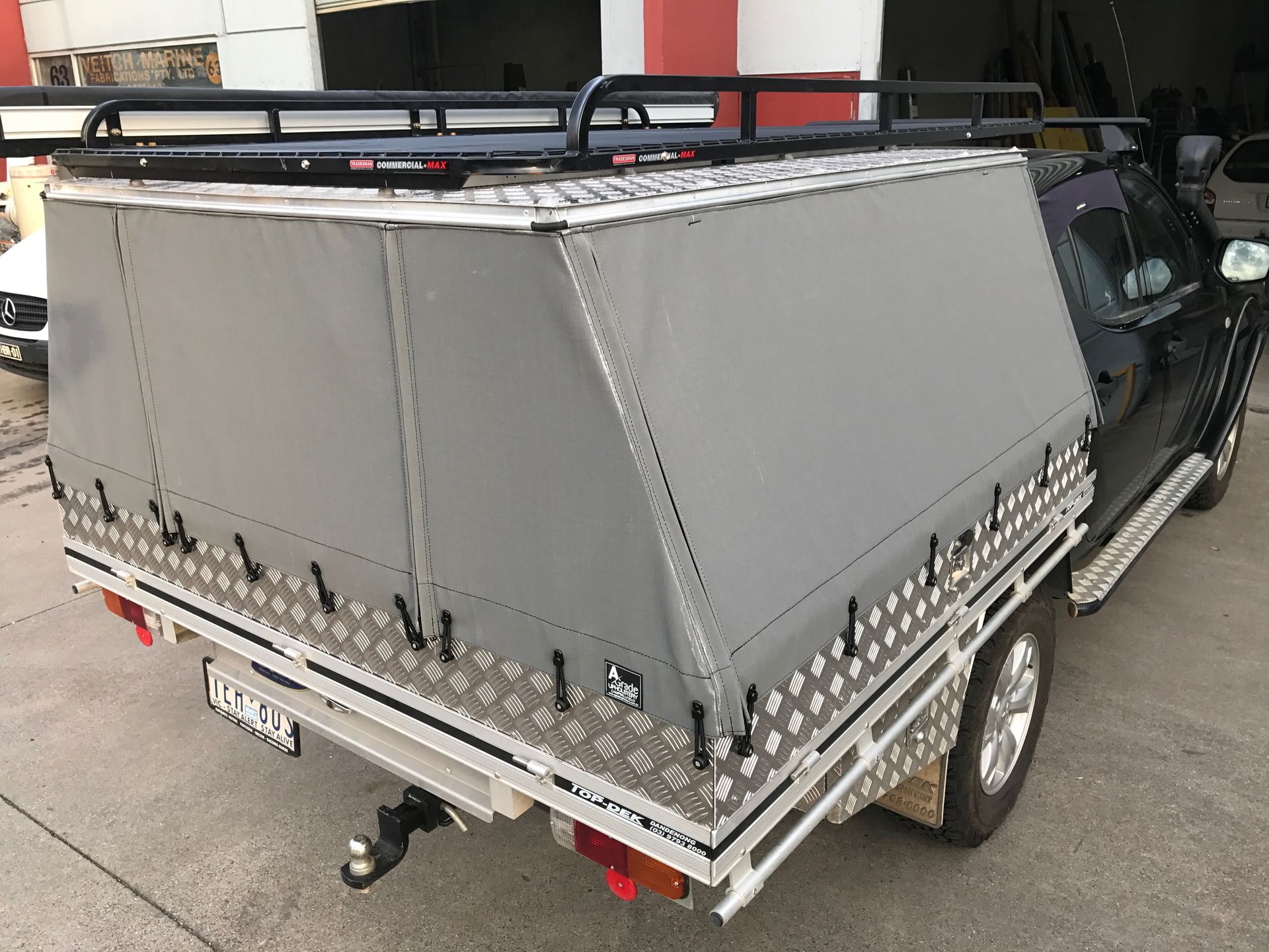 Metal roof canopy with PVC sides