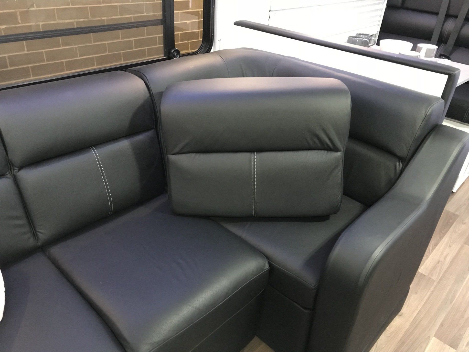 Motorhome lounge in black vinyl