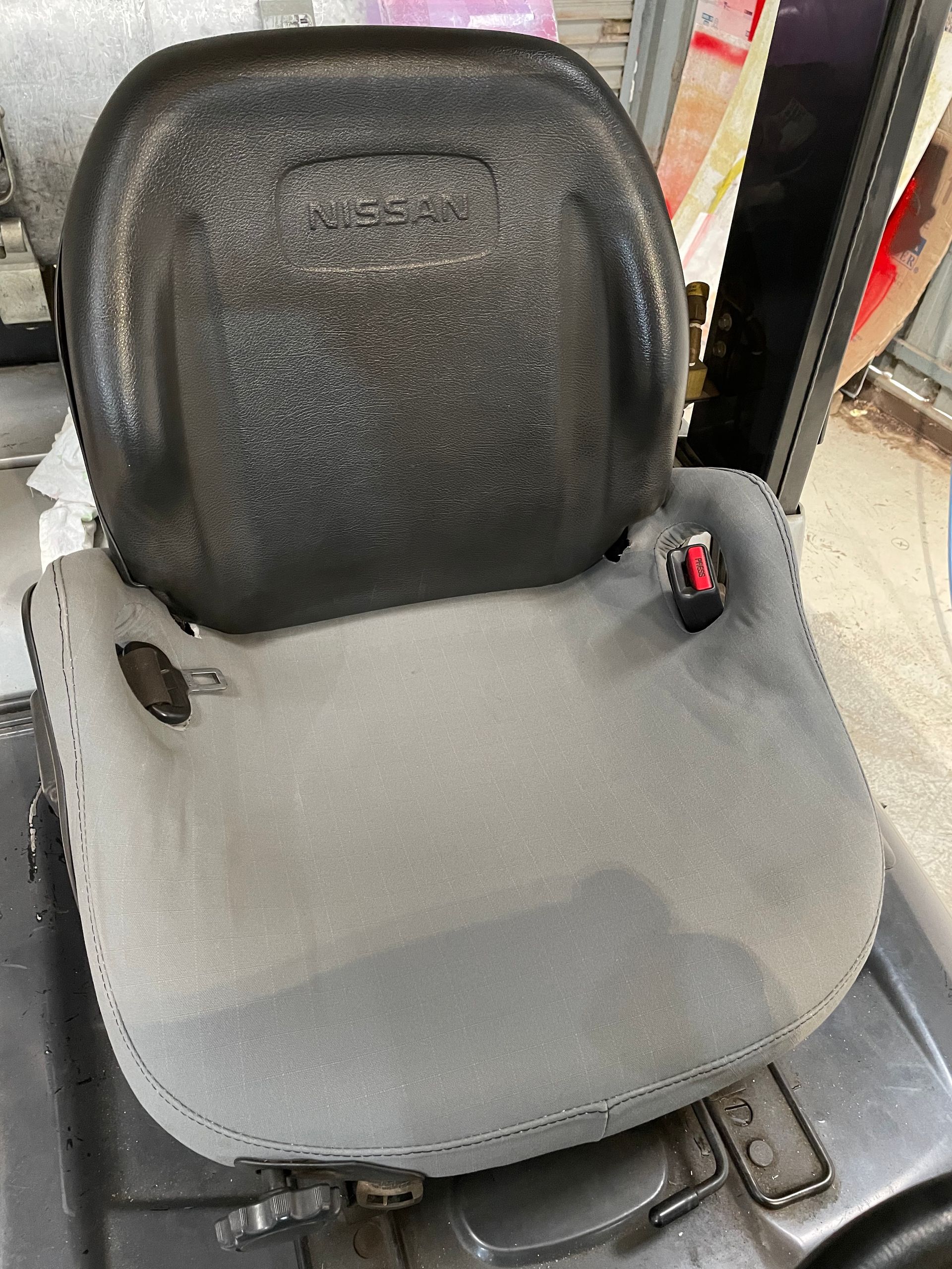 Nissan 25 forklift with 16oz canvas seat cover