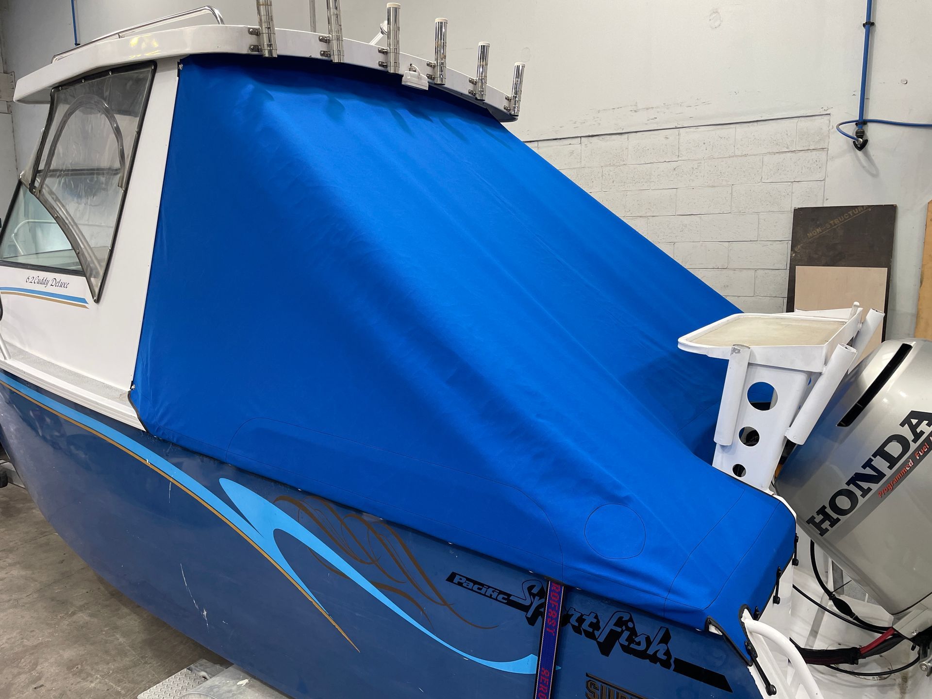 Pacific Sport Fish 6.2 Cuddy Deluxe rear storm cover