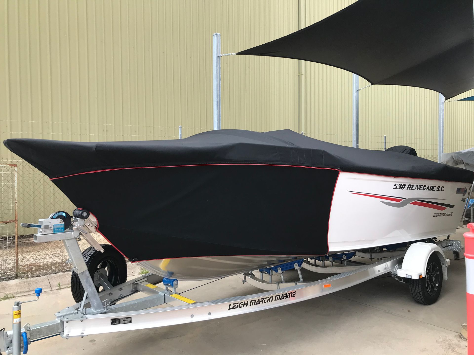 Quintrex 530 Renegade black canvas travelling cover and nose protection