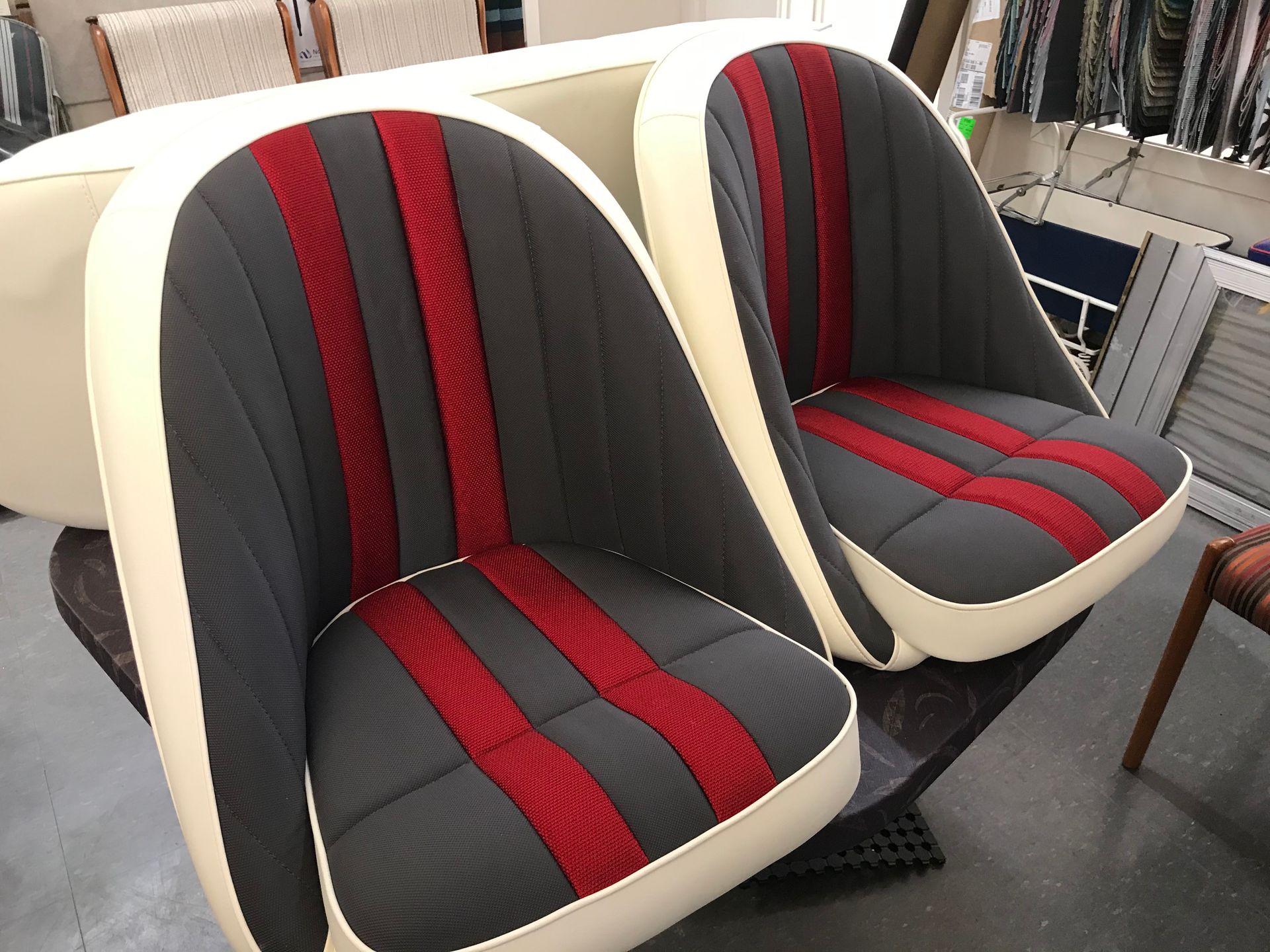 Red and grey velour with cream vinyl bucket seats