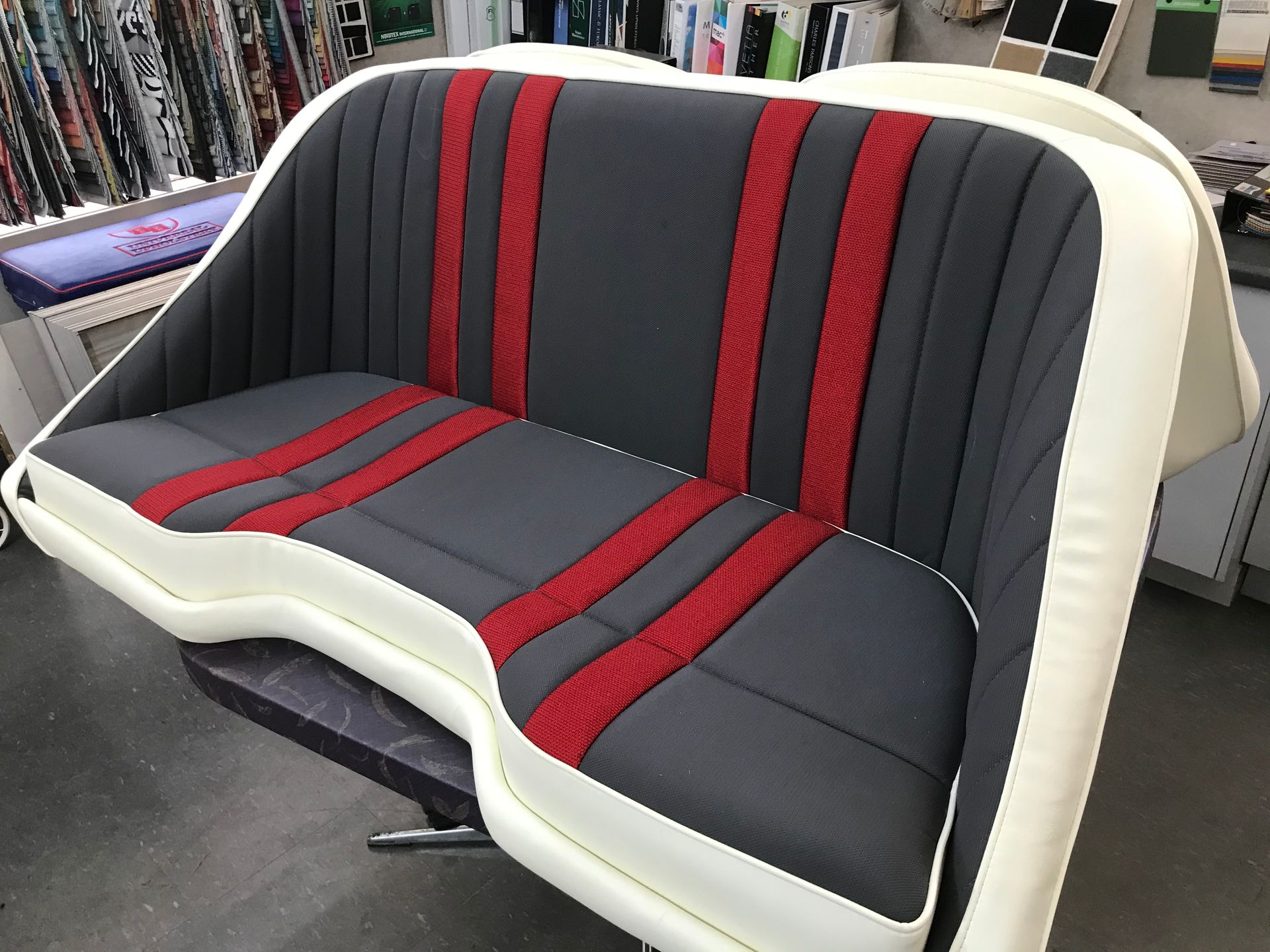 Red and grey velour with cream vinyl rear bench seat