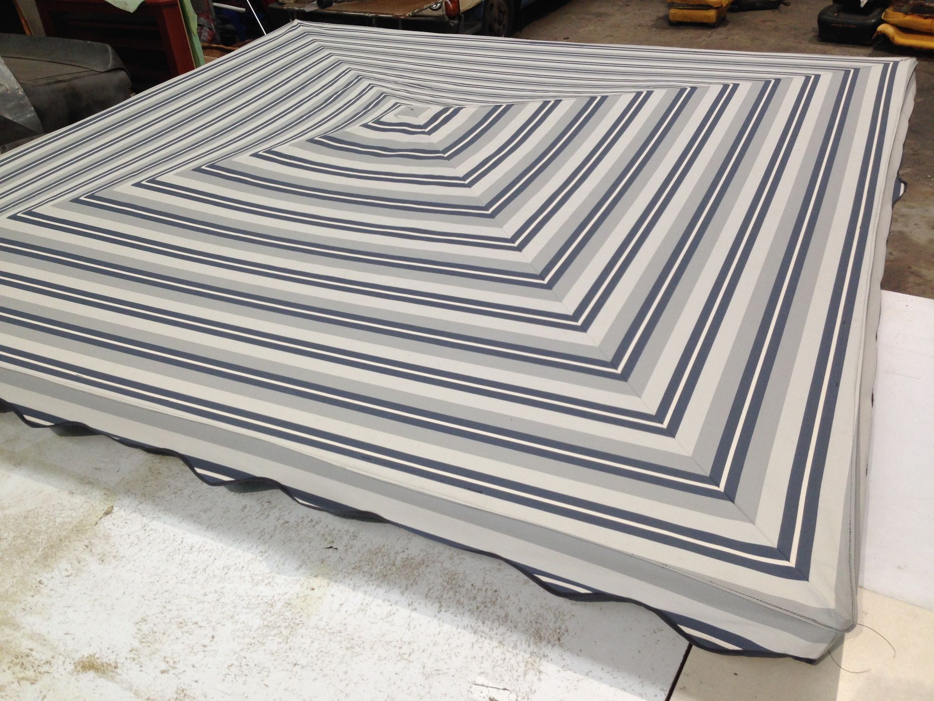 Striped canvas clothesline cover