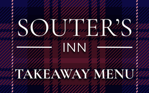 a close up of a plate of food with chicken spare ribs and sauce on a table .