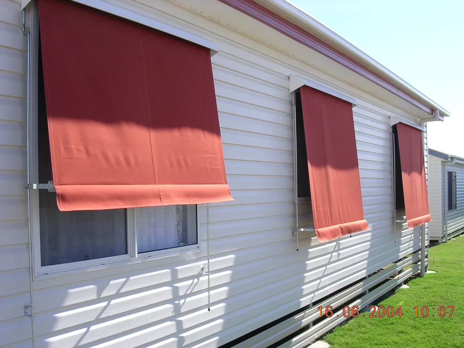 Three Red Window Awnings — Advantage Screen And Blinds Rockhampton in Gracemere, QLD