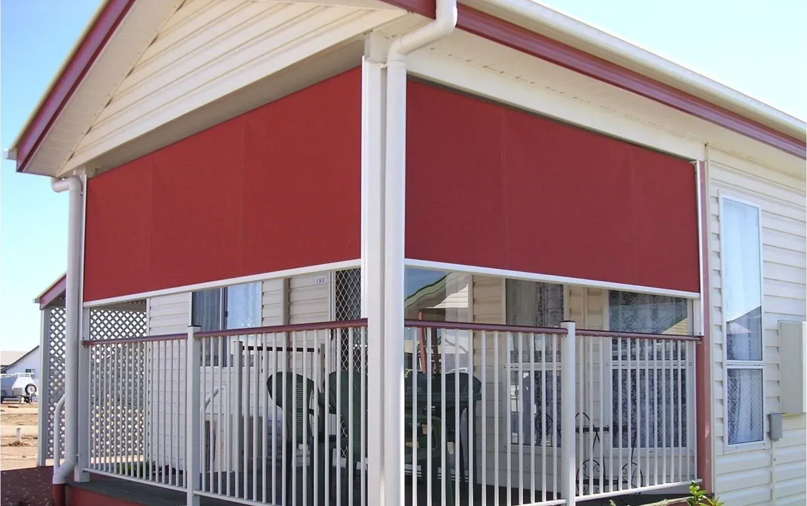A House Porch Featuring Red — Advantage Screen And Blinds Rockhampton in Yeppoon, QLD