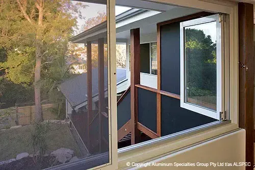 Modern Home With Black Walls and Wooden Supports — Advantage Screen And Blinds Rockhampton in Rockhampton, QLD
